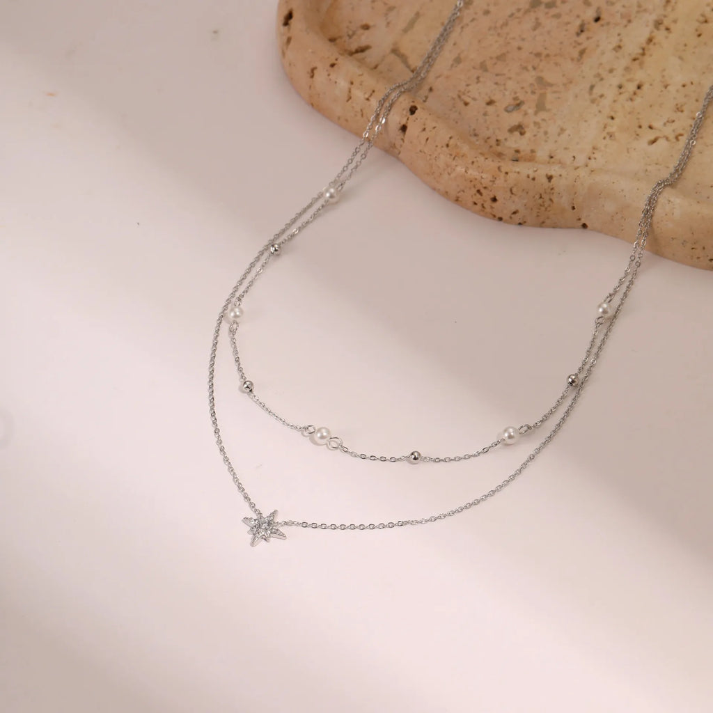 🌟 Celestial Duo Necklace – Double-Layer Necklace with Star & Pearl Accents